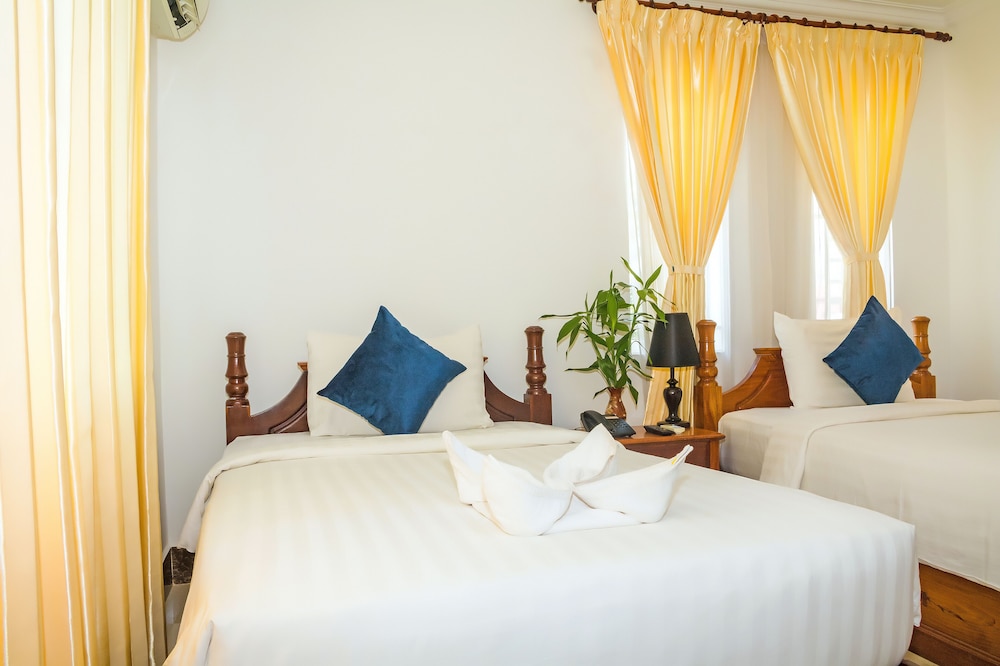 Deluxe Twin Room - Photo 10