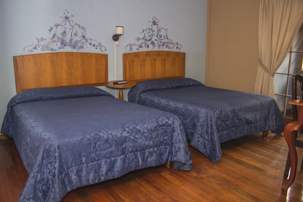 Superior Quadruple Room, 2 Double Beds, Non Smoking, City View photo 2