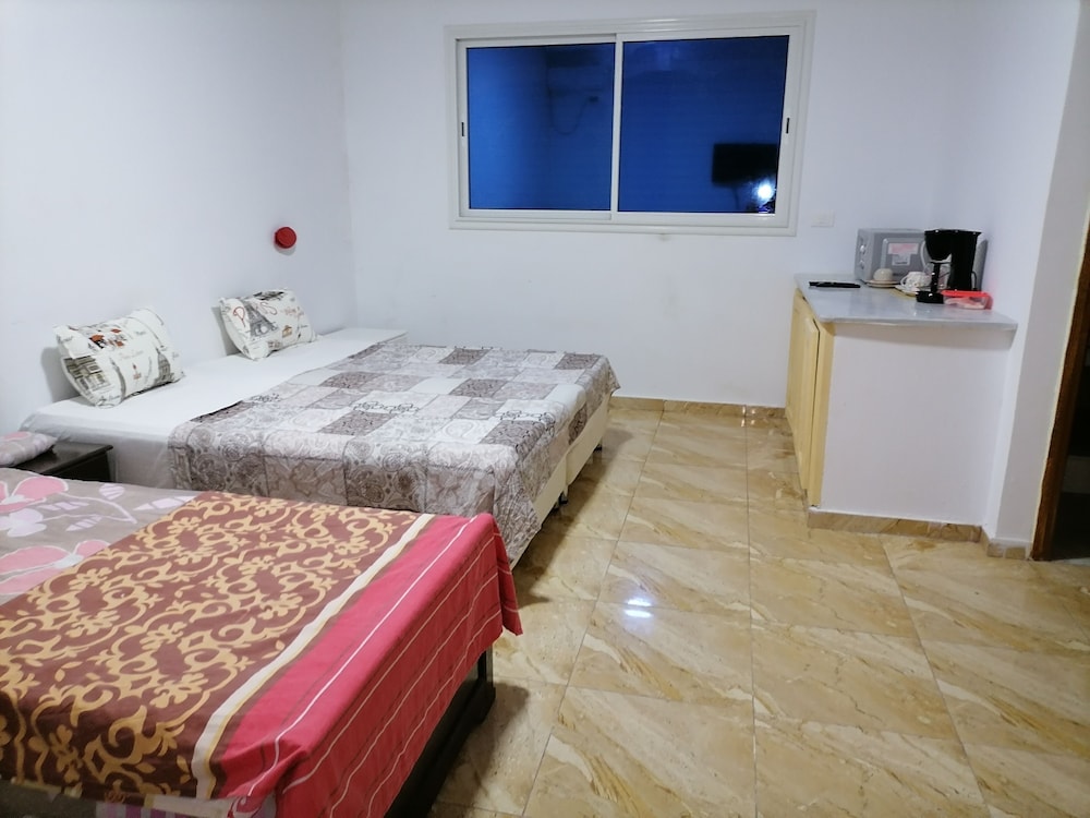 Deluxe Quadruple Room, City View photo 1