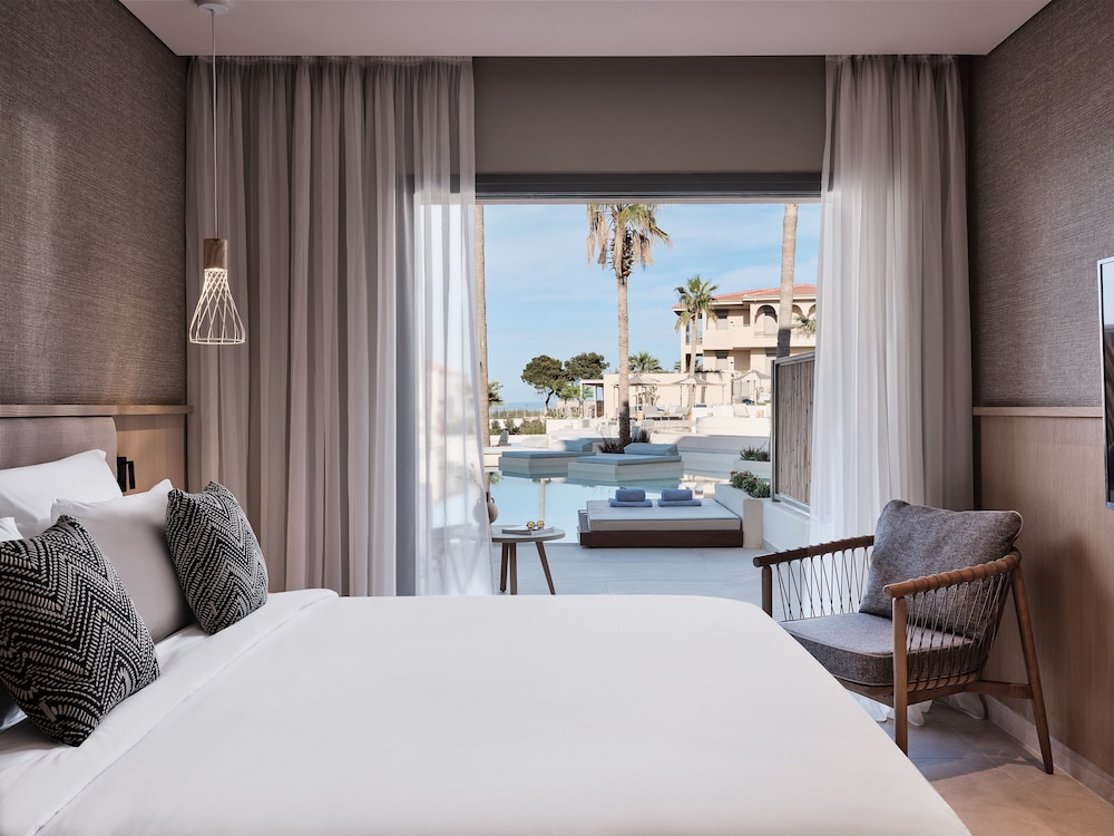 Habitación Doble Deluxe con Vistas al Mar y Piscina Compartida