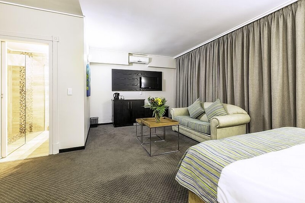 Suite, 1 King Bed with Sofa bed - Photo 9
