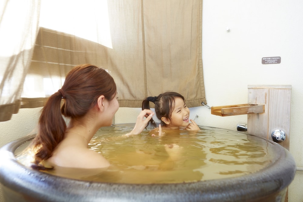 Private open-air Onsen bath / Deluxe Twin Room with Tatami Area / Airport View photo 2