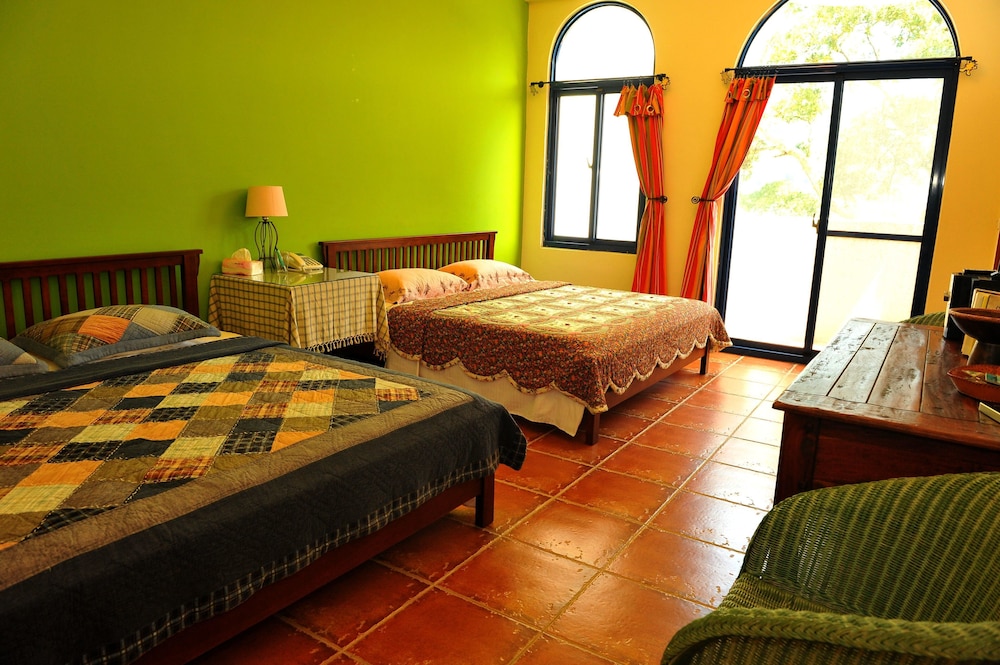 Signature Quadruple Room, 2 Double Beds, Balcony, Mountainside photo 1