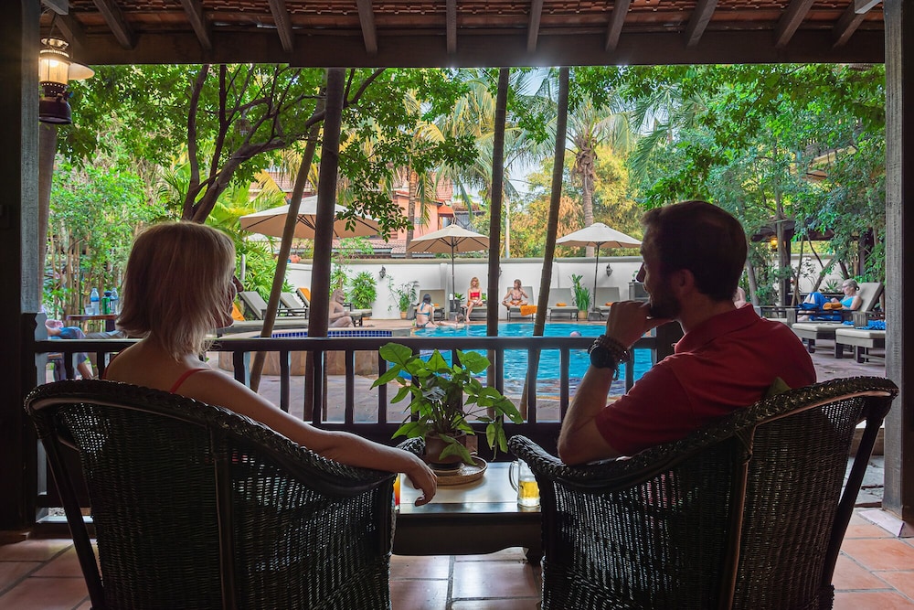 Deluxe Triple pool view - Photo 13