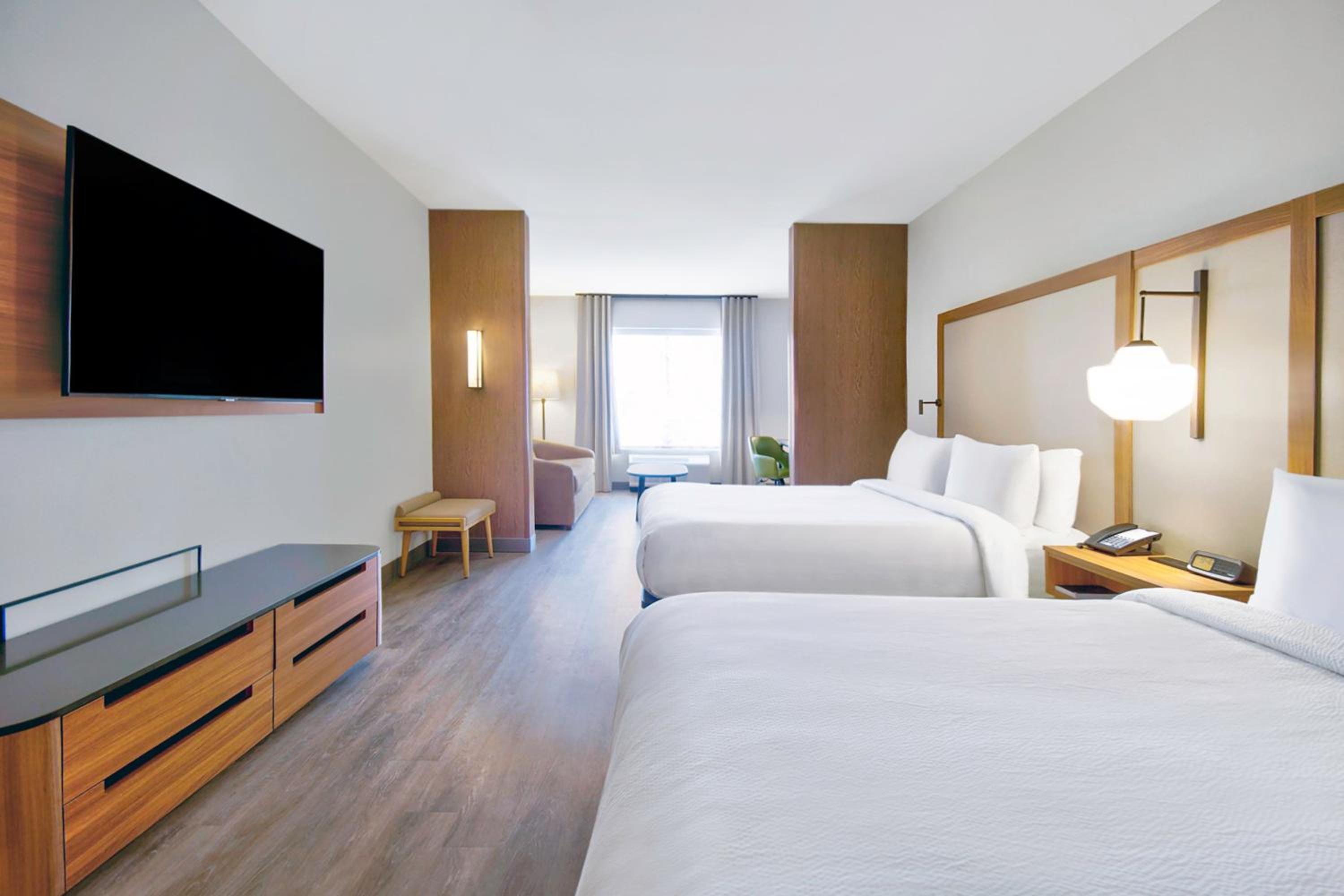 Queen Suite with Two Queen Beds and Sofa Bed - Photo 1