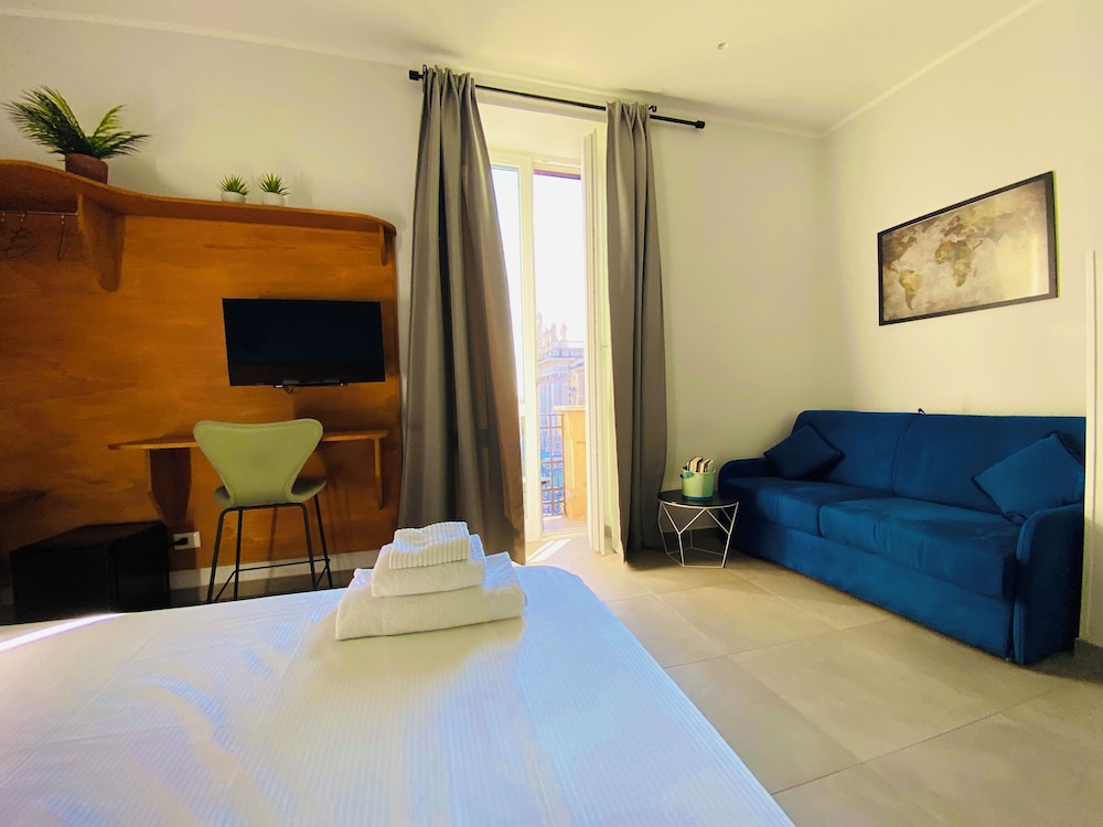Deluxe Quadruple Room, Balcony, City View