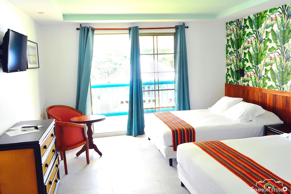 Comfort Quadruple Room, 2 Queen Beds, Non Smoking photo 1