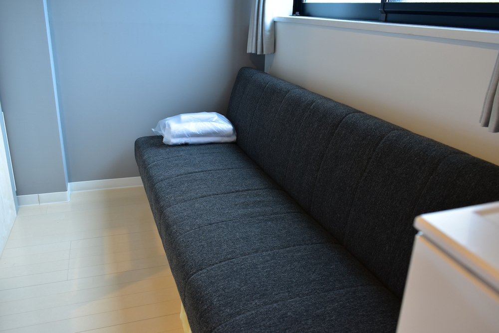 Business Quadruple Room - Photo 17