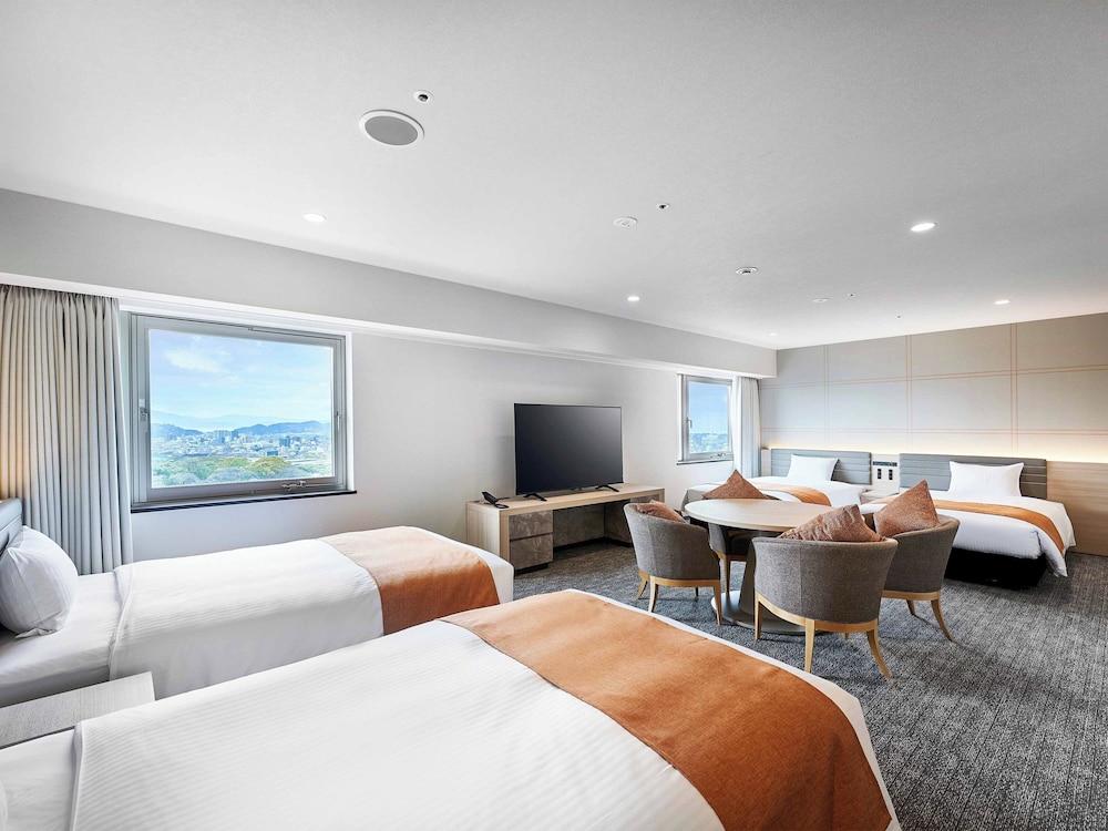 Family Fourth Room with CASTLE view and four single size beds. (Non-smoking) (For 4 person)
