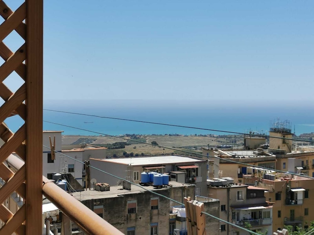 Camera Tripla vista mare parziale con balcone