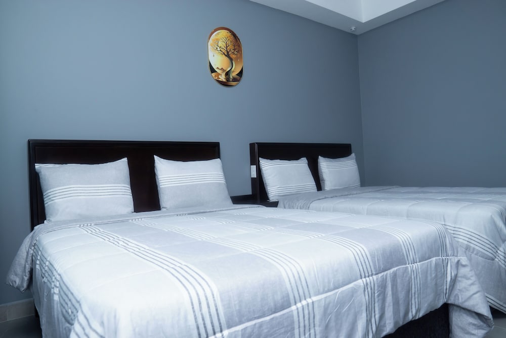 Exclusive Suite, Multiple Beds, Kitchenette, Courtyard View