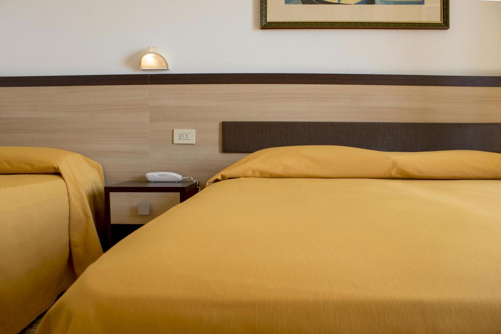 Quadruple Room with Balcony - Photo 1