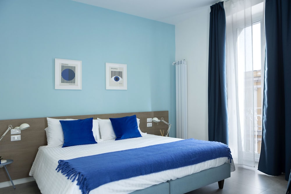 Deluxe Quadruple Room, Balcony, City View