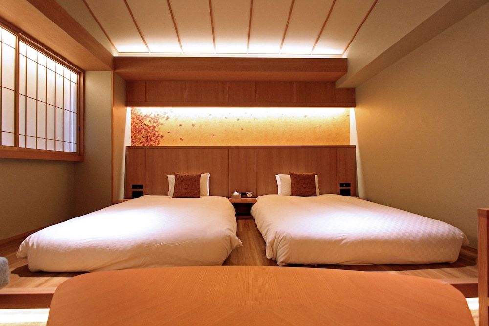 Deluxe Room, 2 Double Beds, Non Smoking, Bathtub,Ceiling height 3m(with Single Sofabed) - Photo 17