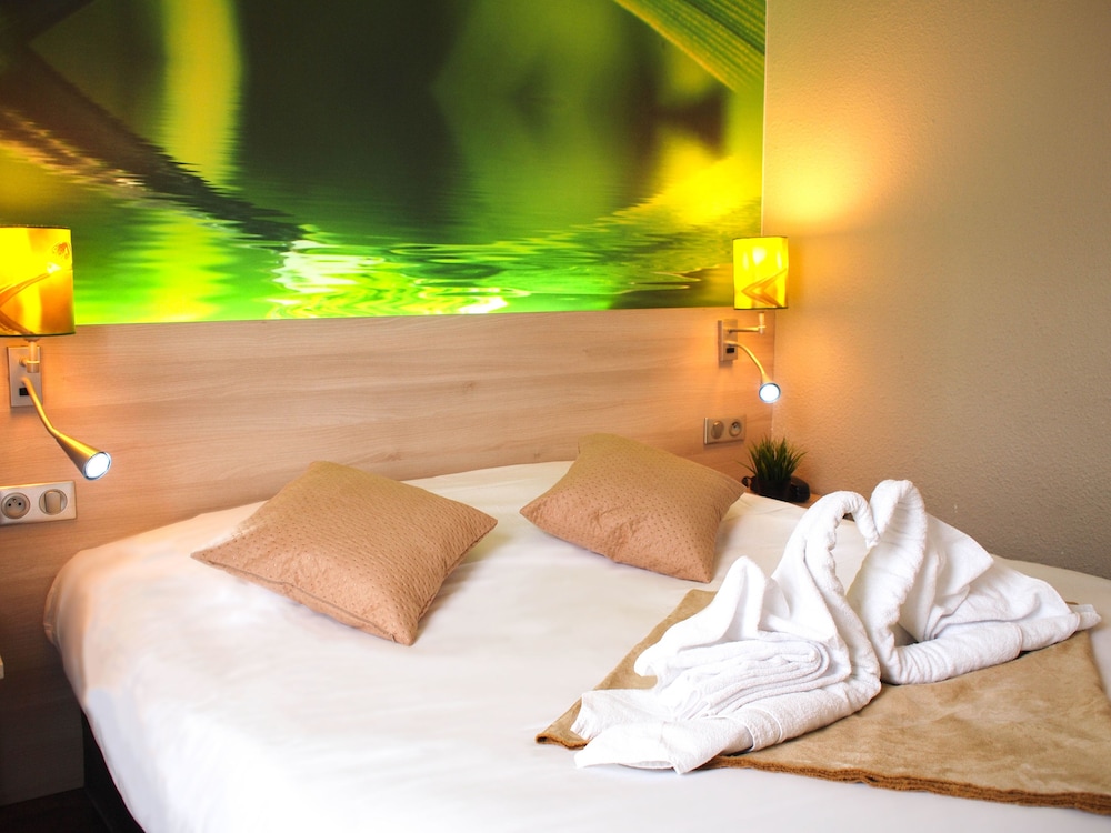 Triple Room (1 grand lit + 1 lit d’une personne) photo 2