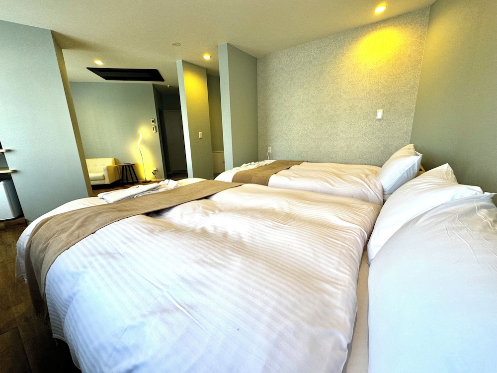 Deluxe Quadruple Room - Photo 8