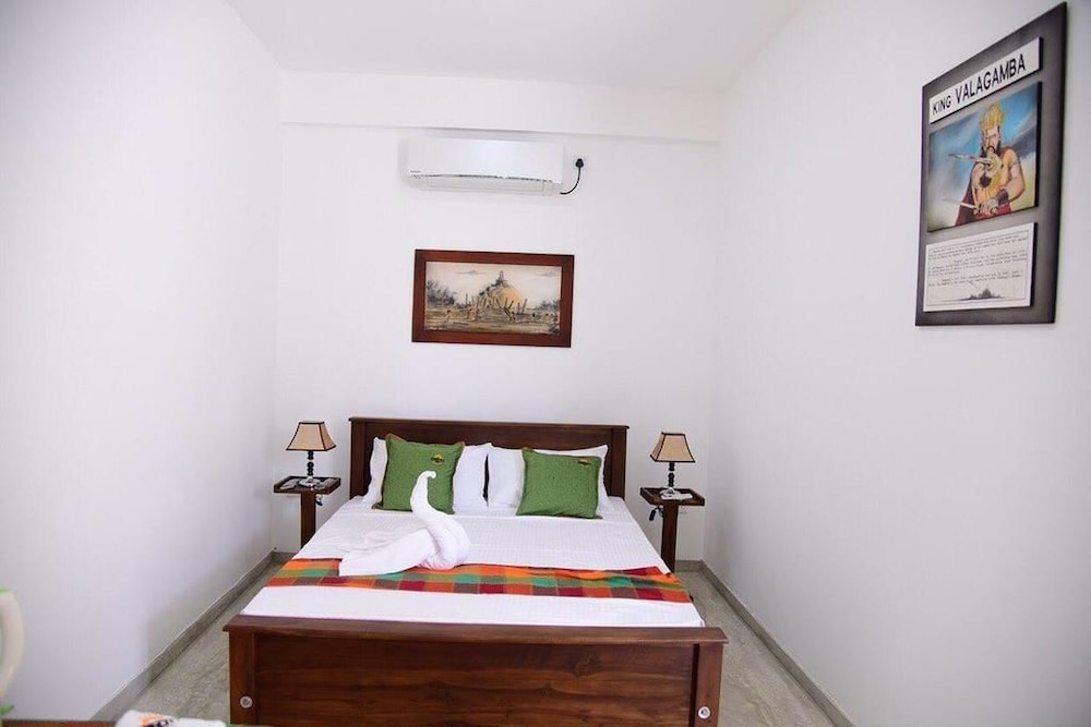 Deluxe Quadruple Room, 2 Double Beds, Pool View photo 3