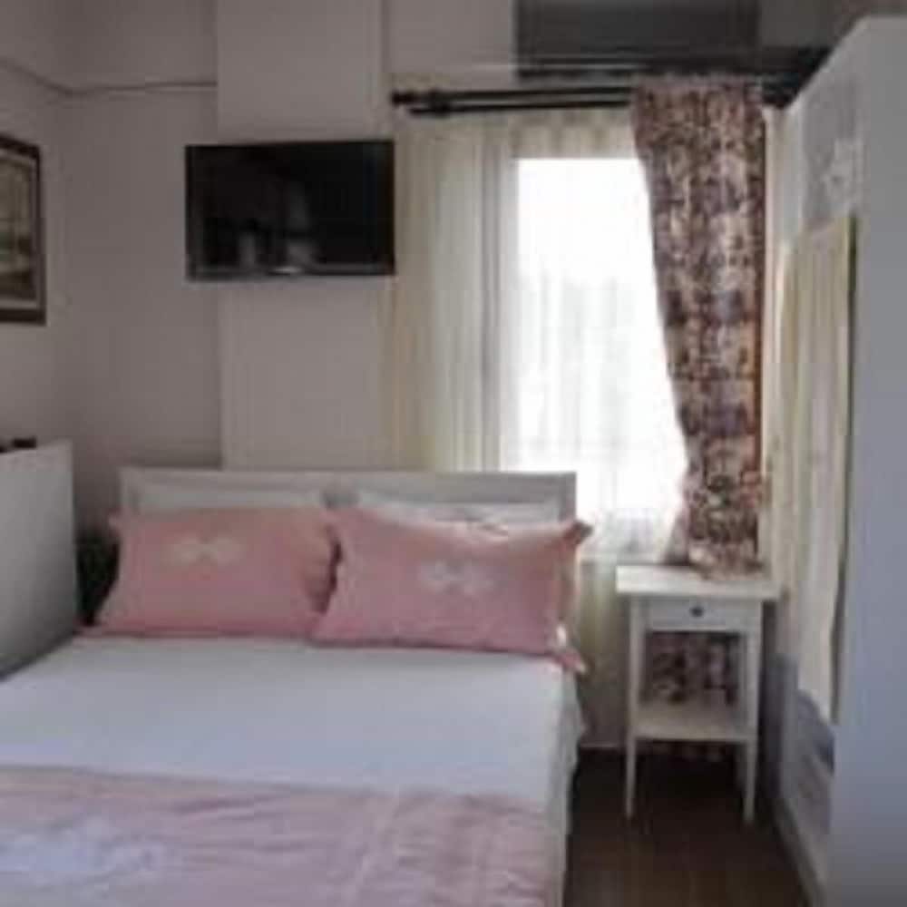 Standard Triple Room, Multiple Beds, Garden View photo 3