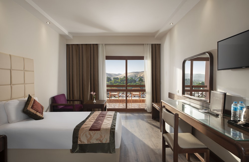 Standard Triple Room, Garden View - Photo 6