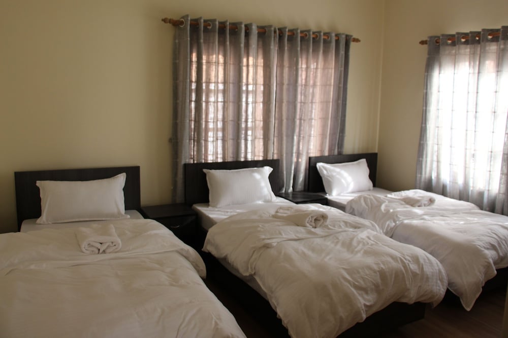 Economy Double Room Single Use, 2 Double Beds, Shared Bathroom, Valley View photo 1