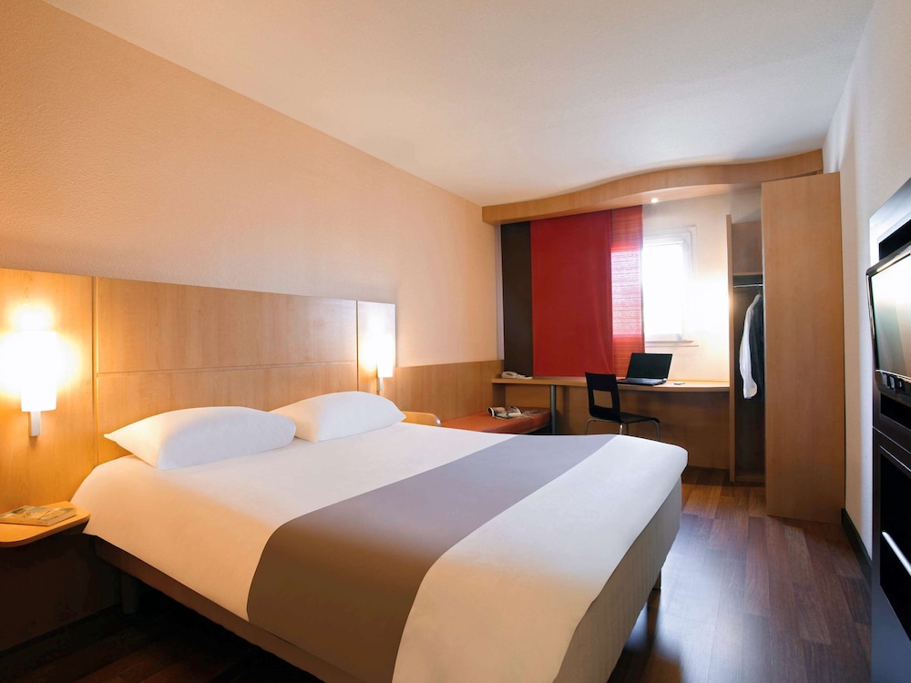Chambre triple avec 1 lit double et 1 lit d'appoint
