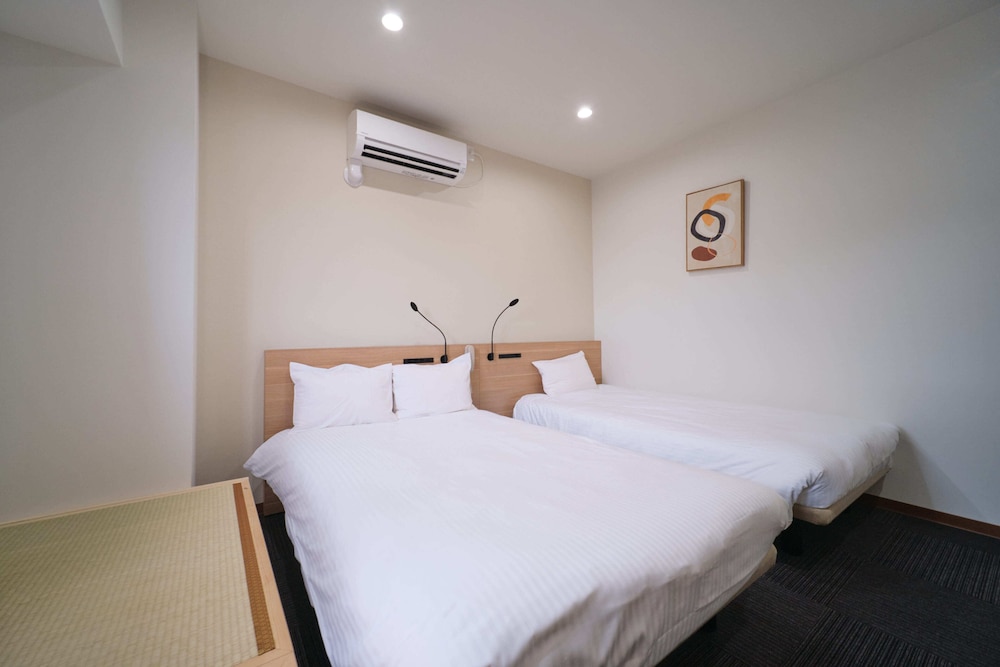 Basic Triple Room photo 2
