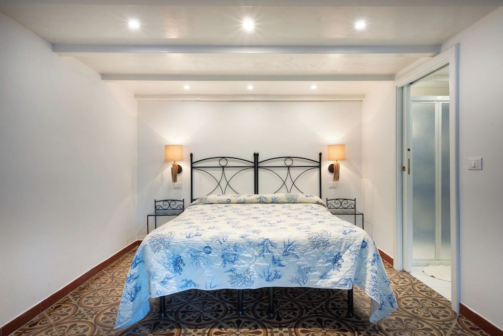Comfort Quadruple Room, Courtyard Area