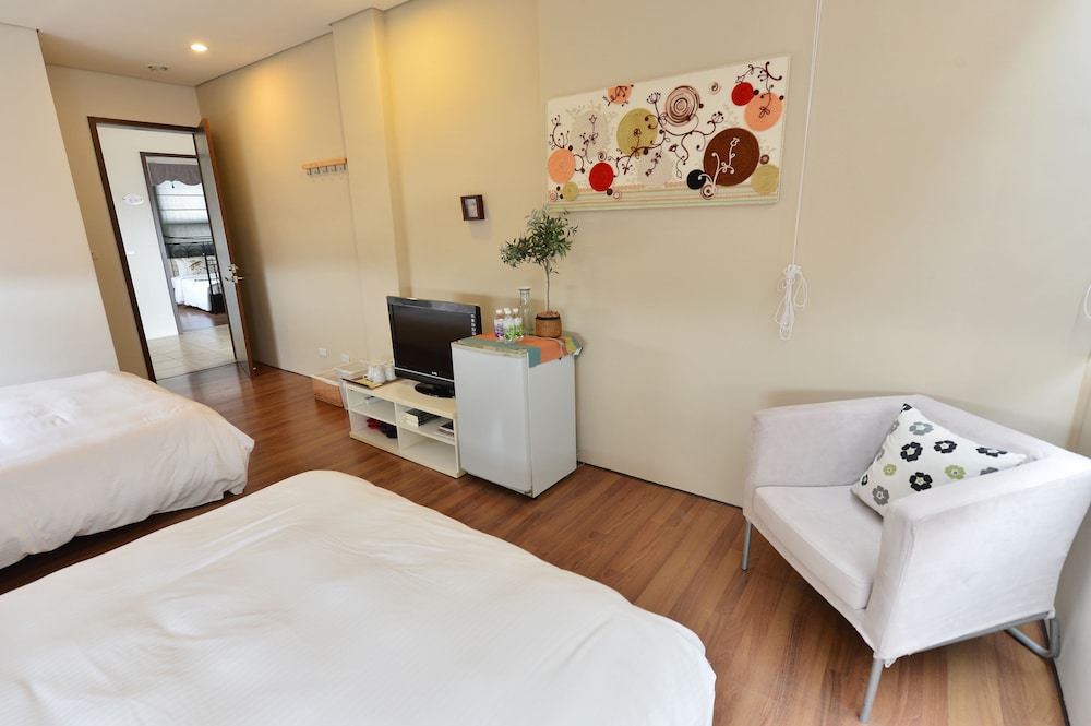 Family Quadruple Room, 2 Double Beds, Ocean View, Beachside photo 2