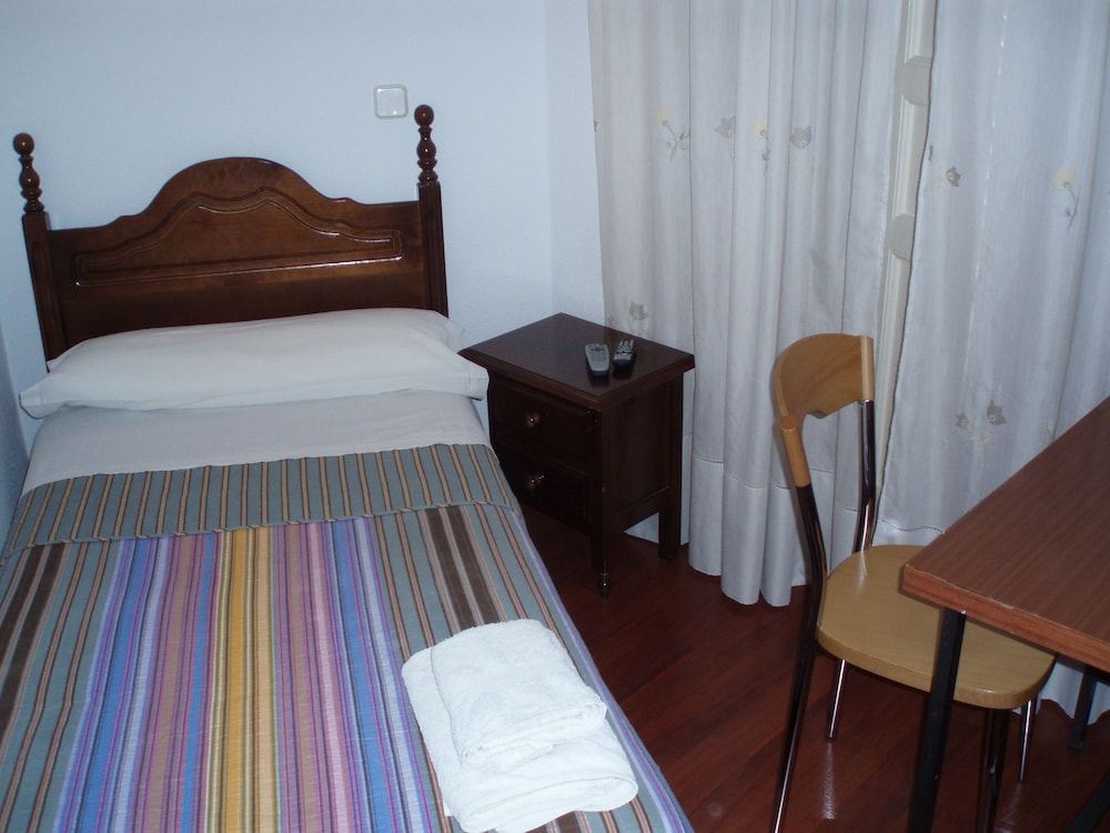 Habitación individual, baño compartido