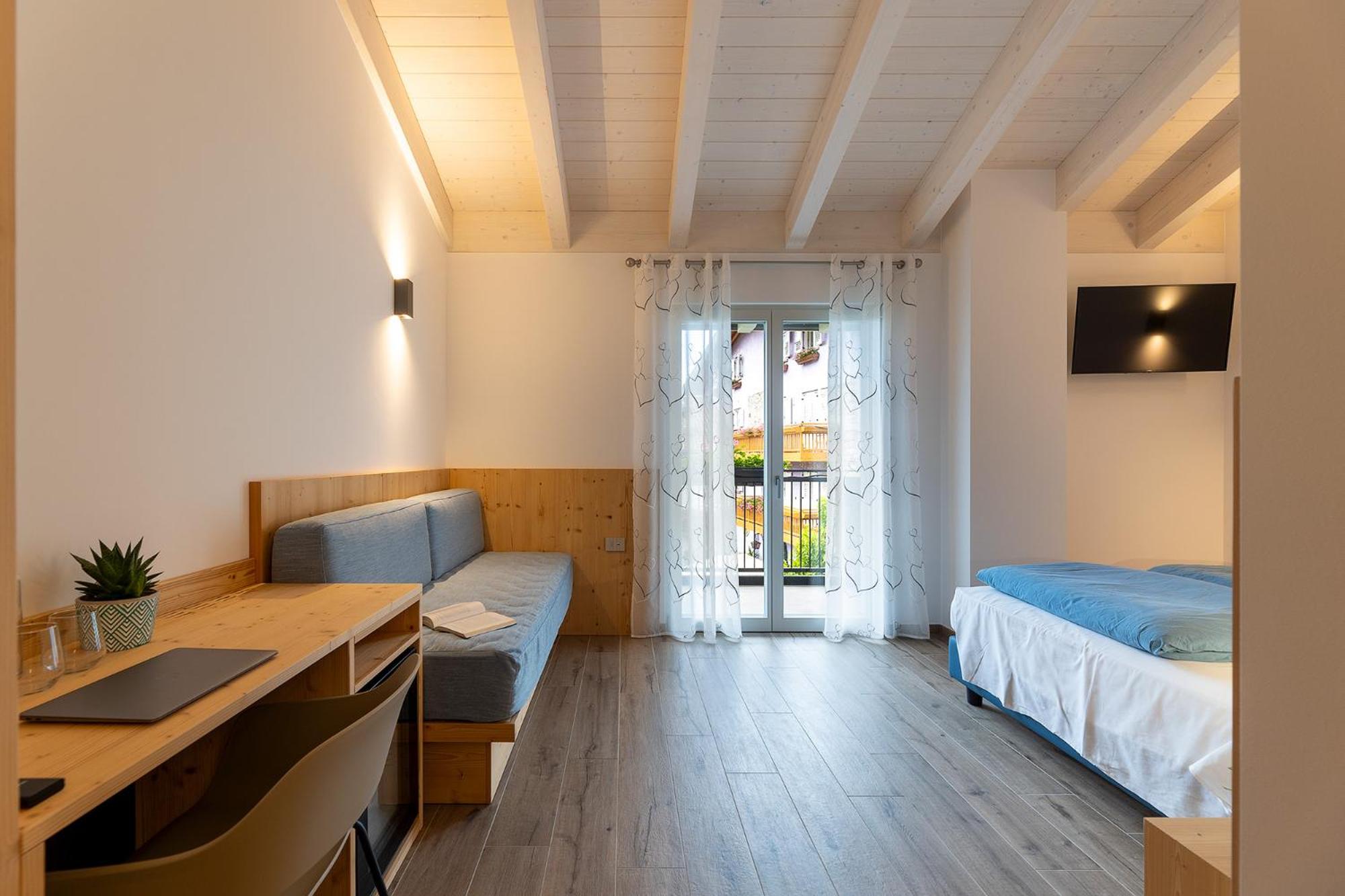 Deluxe Triple Room - Photo 11