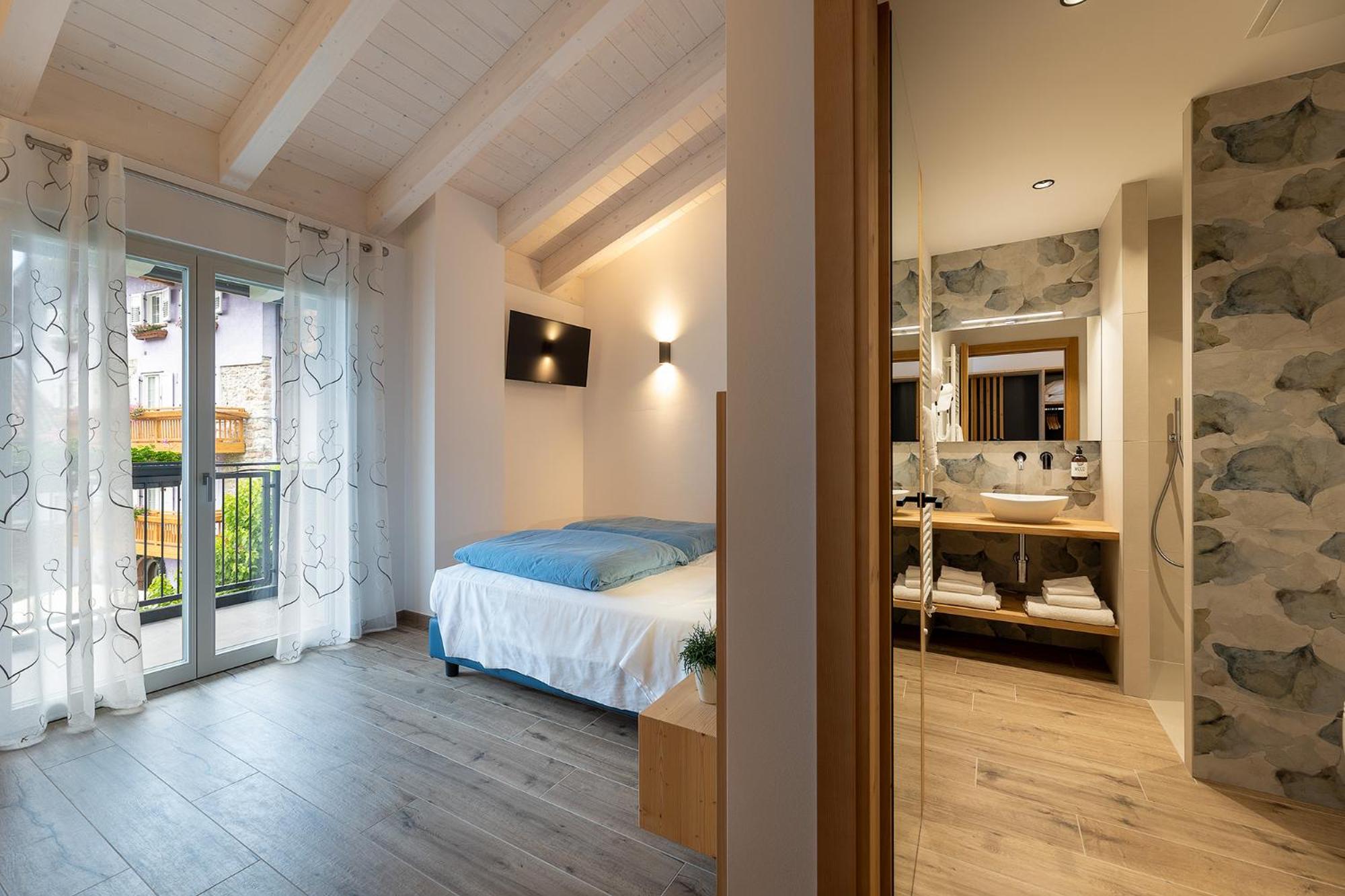Deluxe Triple Room - Photo 20