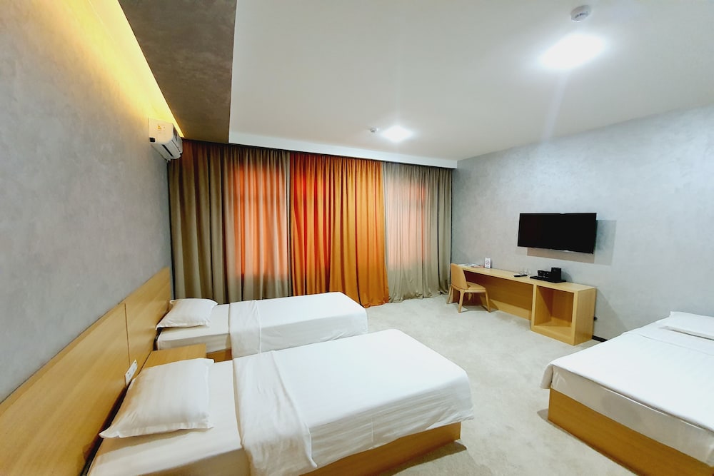 Deluxe Triple Room