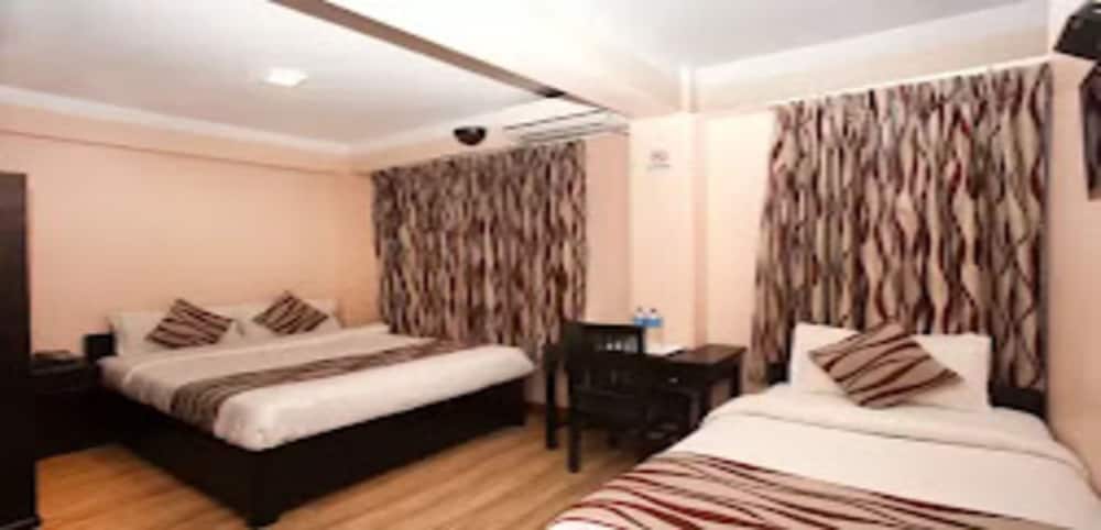 Deluxe Triple Room