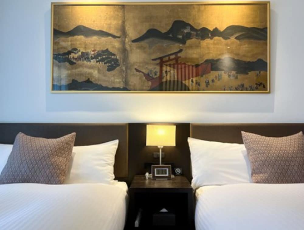 Premium Twin Room - Photo 18