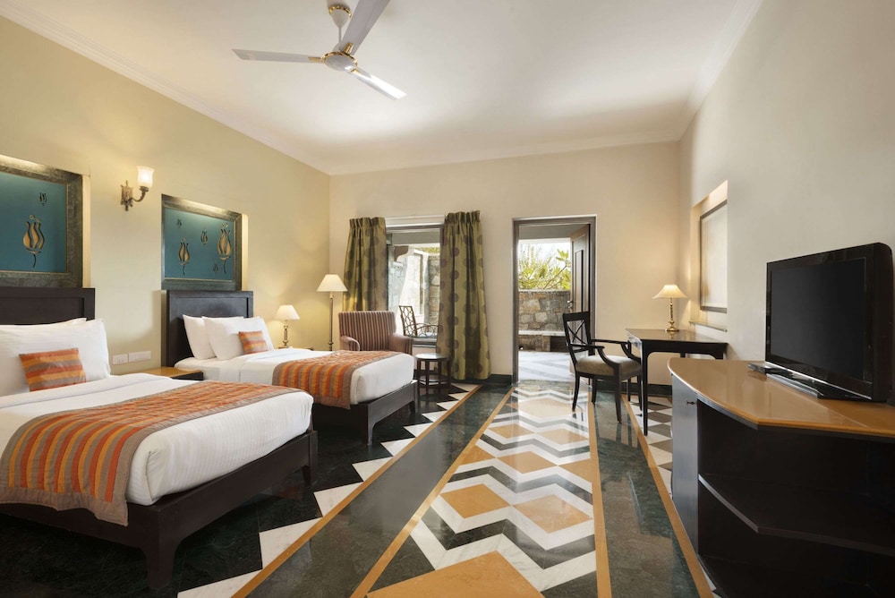 Super Deluxe Room with Private Sit- Out area with Garden & City View- Accessible room