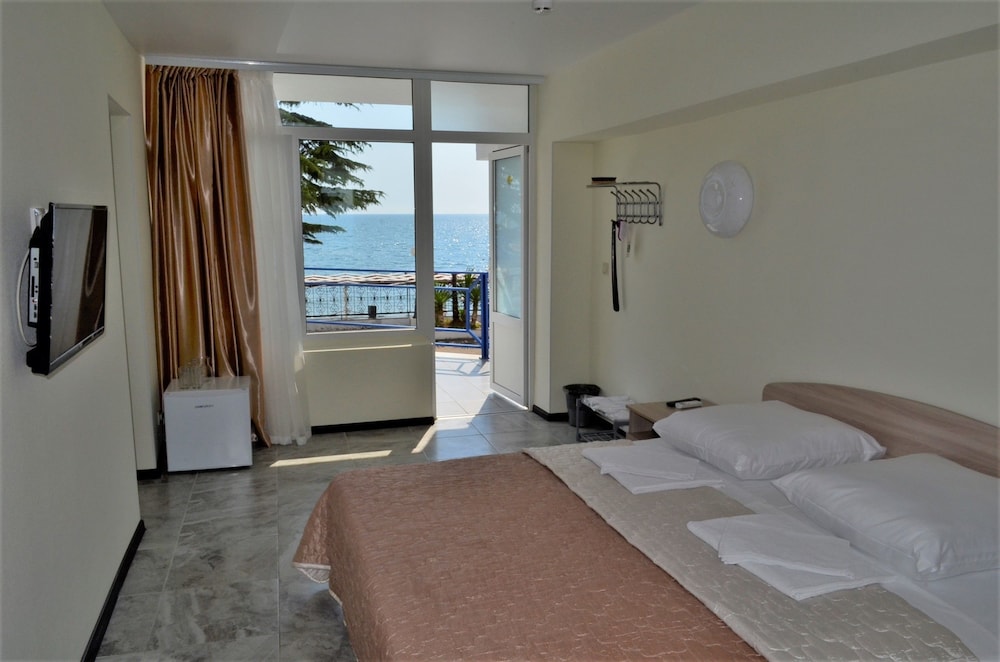 Family Quadruple Room, 2 Bedrooms, Sea View, Ground Floor photo 1