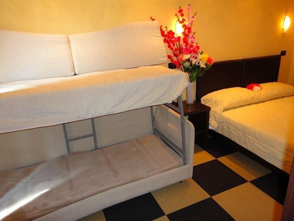 Quadruple Room - Photo 1