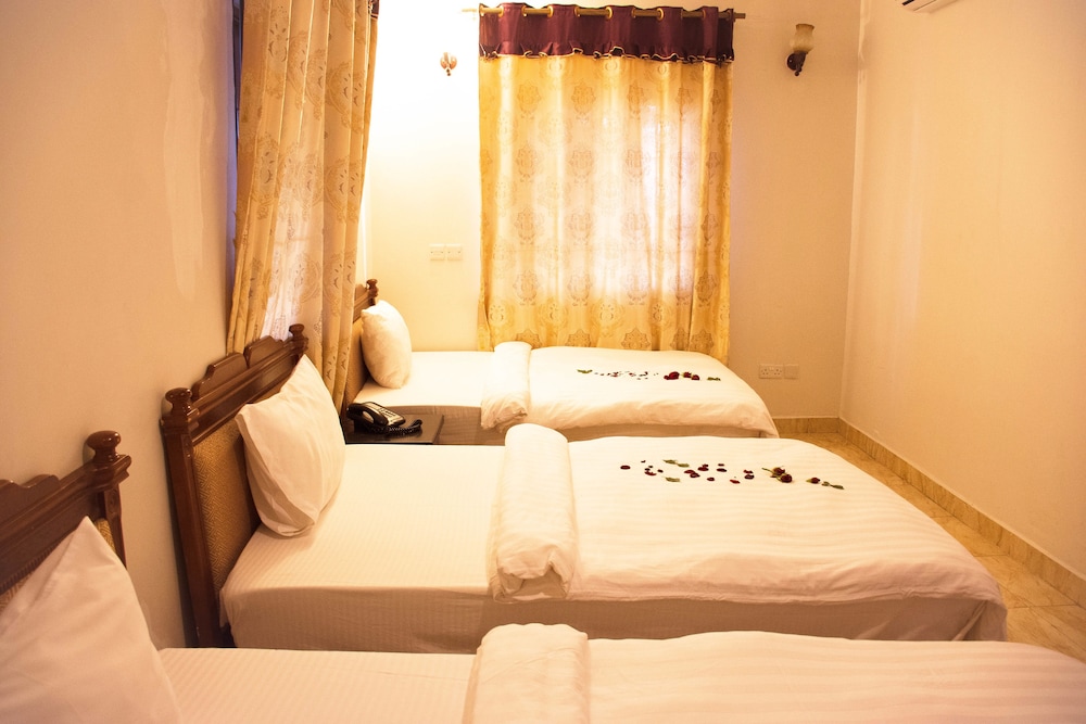 Deluxe Triple Room