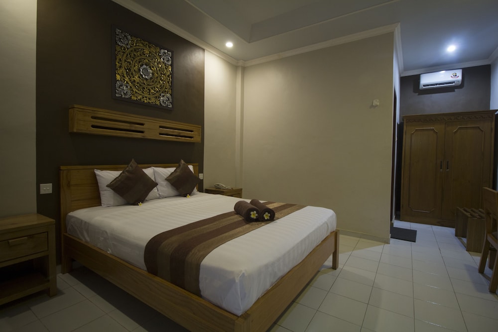 Deluxe Room - Photo 10