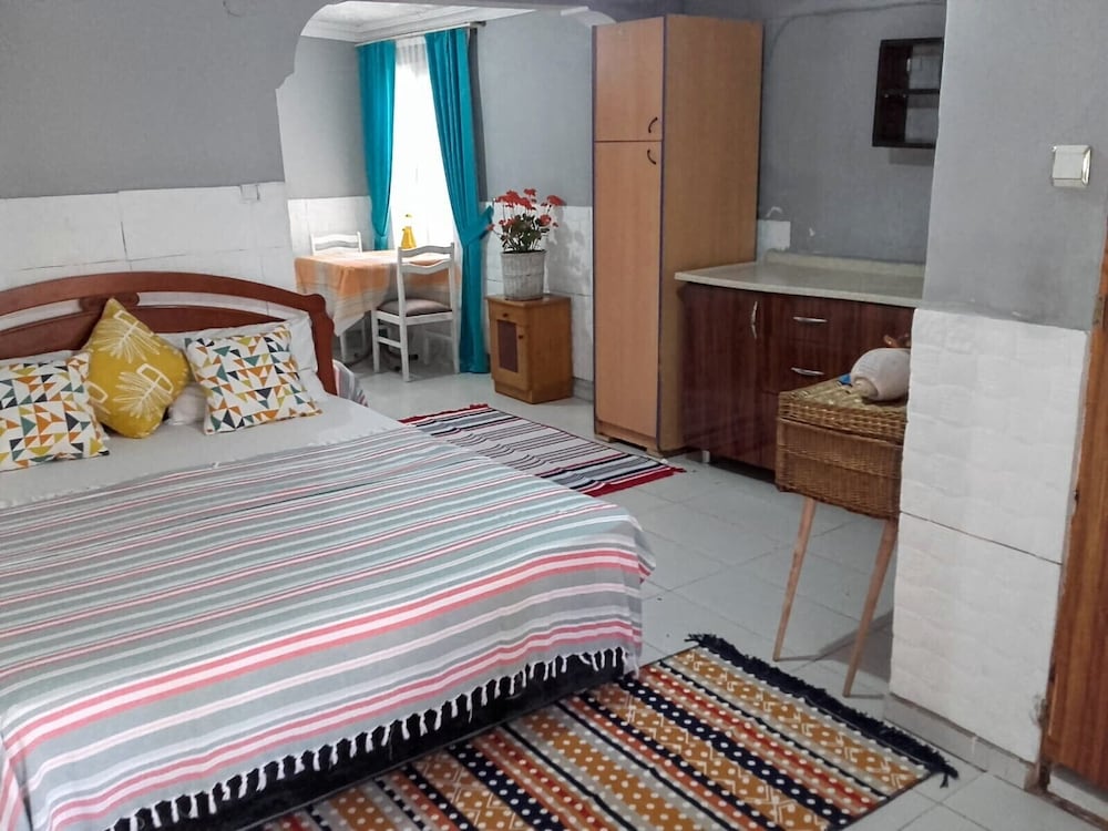 Family Quadruple Room, Multiple Beds, Kitchen, Garden Area photo 1