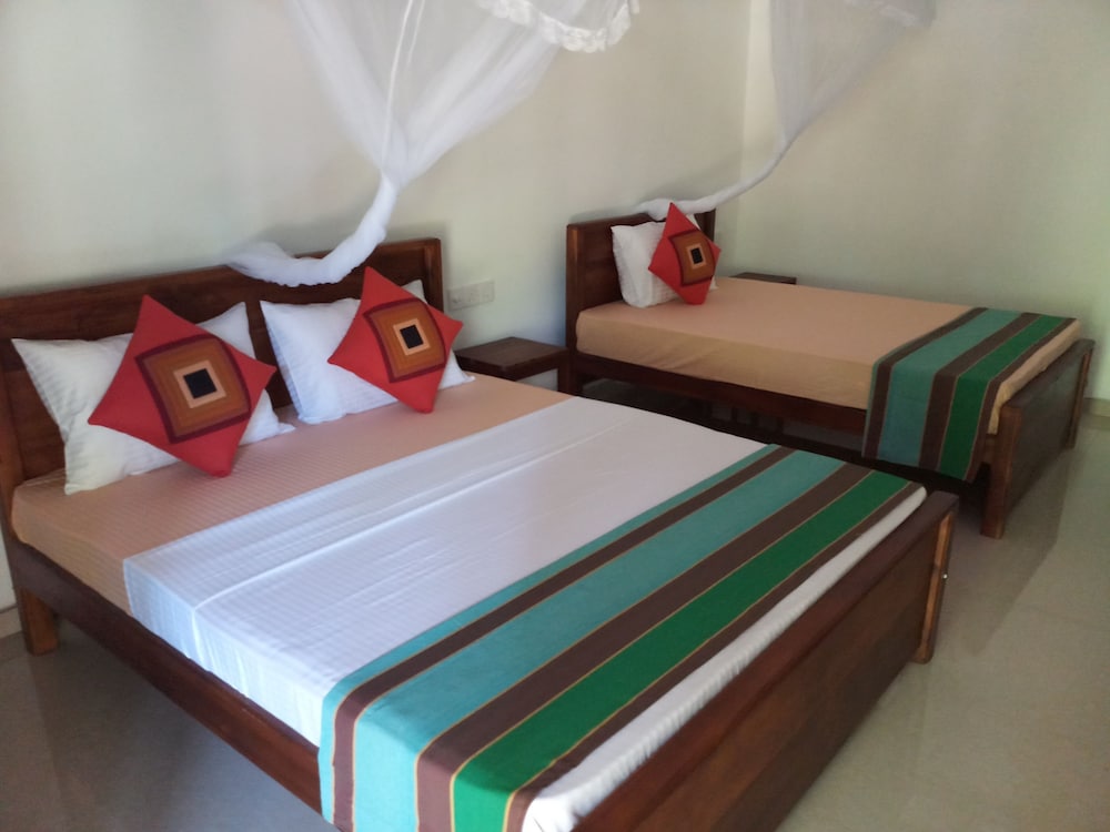 Deluxe Triple Room, 3 Bedrooms, Non Smoking, Garden View photo 2