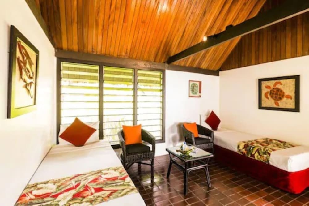 Beachfront Bure (1 Double and 2 Single Bed) photo 5