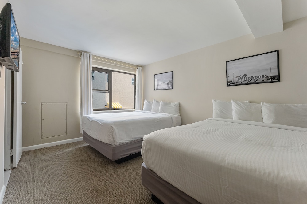 Economy Double Room, 2 Queen Beds, Non Smoking photo 2