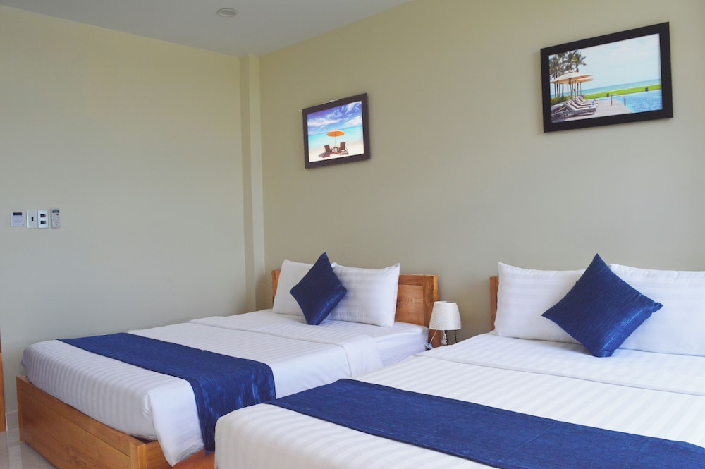 Deluxe Triple Room - Photo 1