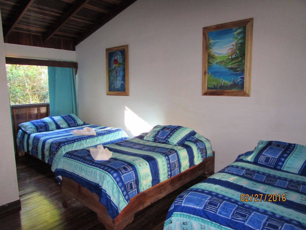 Basic Triple Room, 1 Bedroom, Mountain View, Garden Area photo 3