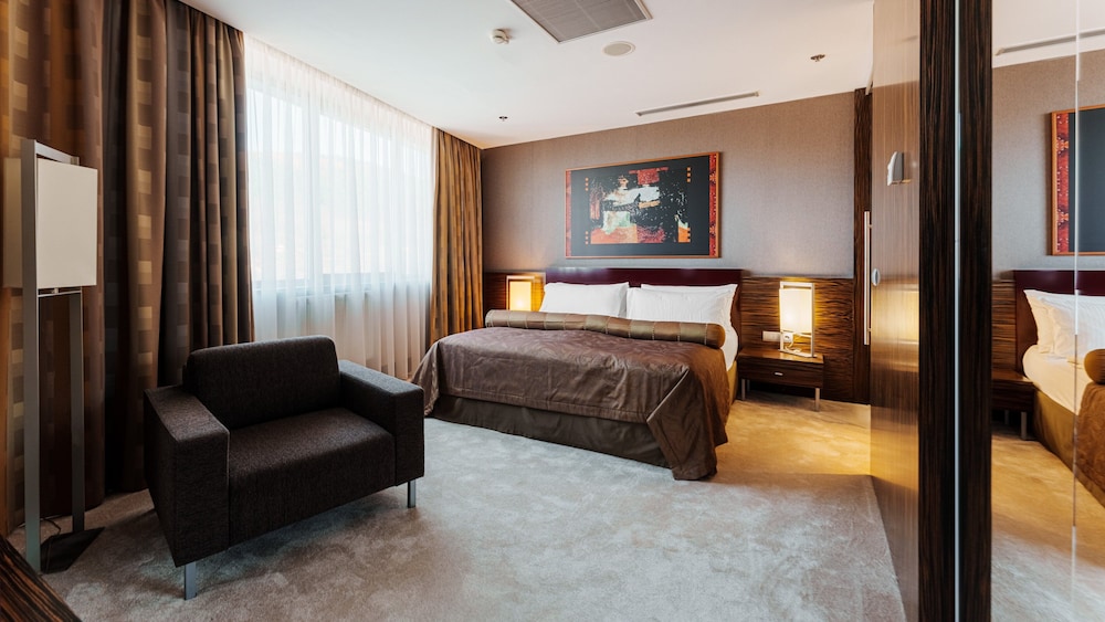 Suite, 1 King Bed with Sofa bed, City View - Photo 1