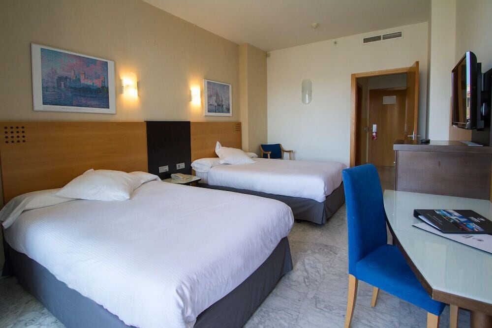 Triple Room (2 Adults + 1 Child) photo 3