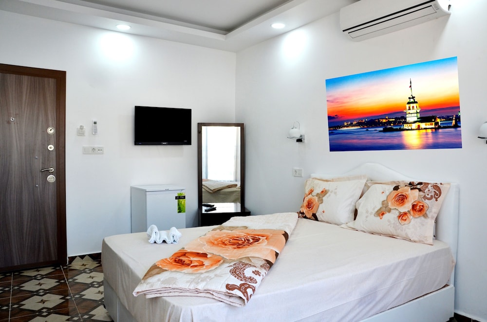 Deluxe Triple Room, Garden View photo 1