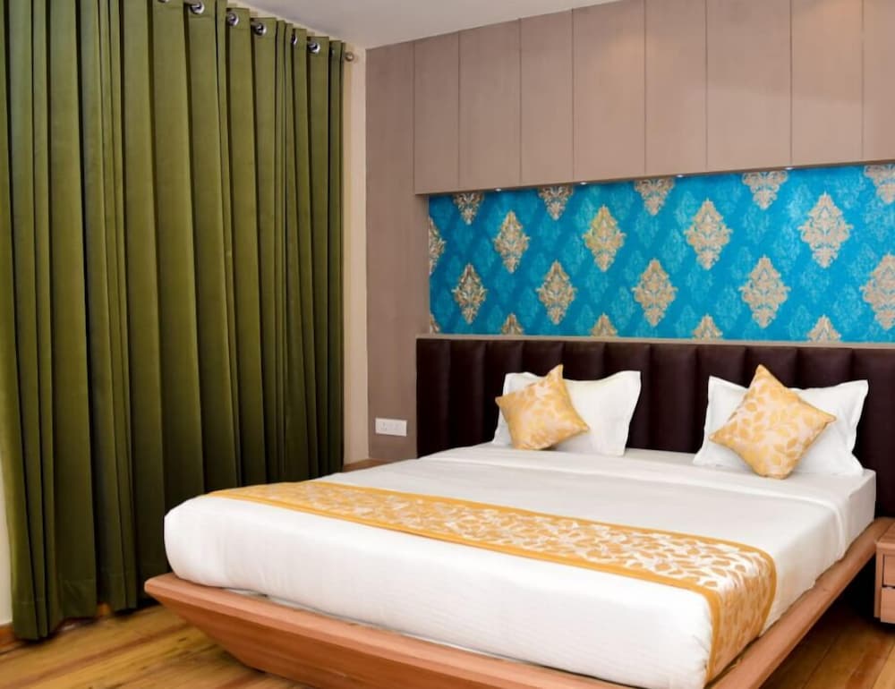 Deluxe Room - Photo 1