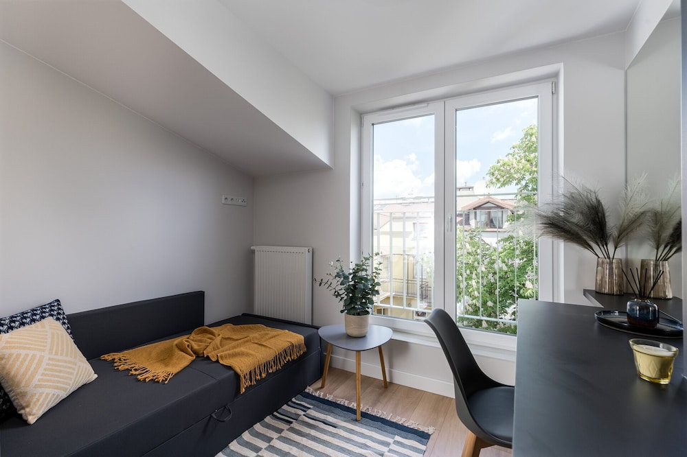 C. Studio Smart Apartments